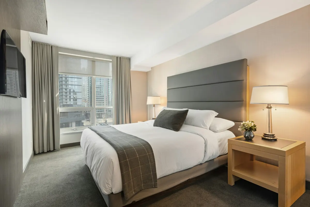 Bedroom with soft grey fitted carpet