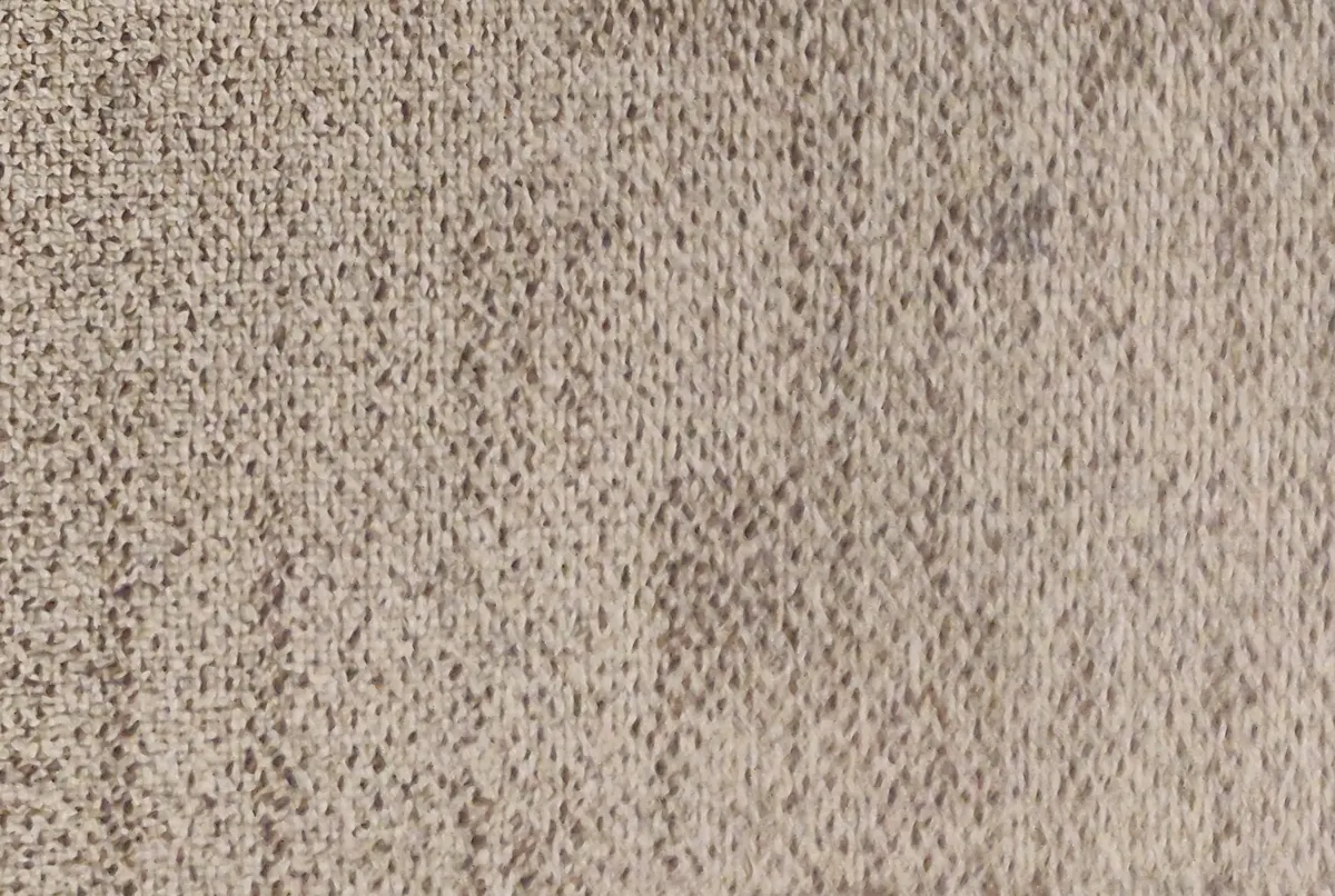 Close-up of an oatmeal textured carpet pile