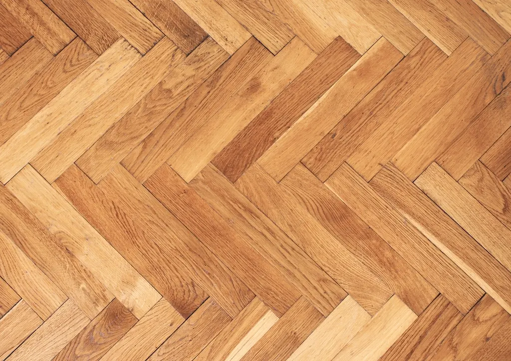 Close-up of oak blocks laid in a herringbone pattern