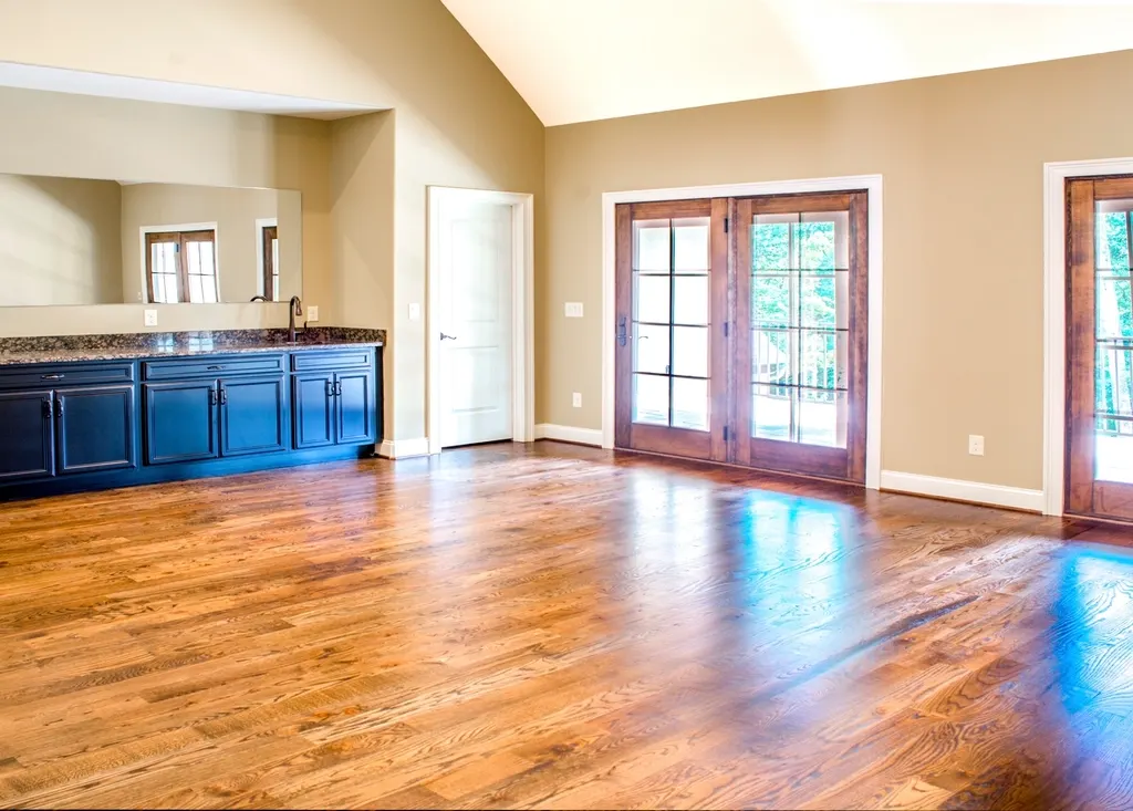 Room with rich, polished solid wood flooring